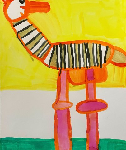 Las jirafas comiendo hierba